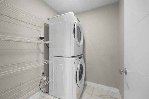 615 Evanston Link Nw, Calgary, AB - Indoor Photo Showing Laundry Room