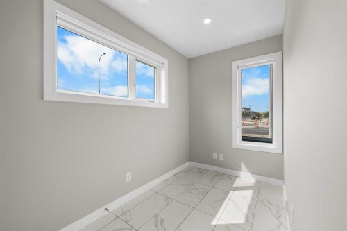 615 Evanston Link Nw, Calgary, AB - Indoor Photo Showing Other Room