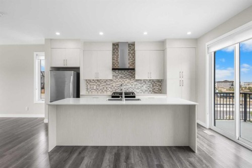 615 Evanston Link Nw, Calgary, AB - Indoor Photo Showing Kitchen With Stainless Steel Kitchen With Upgraded Kitchen