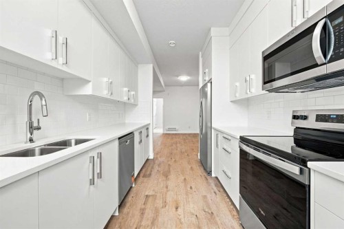 268 Huxbury View Ne, Calgary, AB - Indoor Photo Showing Kitchen With Stainless Steel Kitchen With Double Sink With Upgraded Kitchen