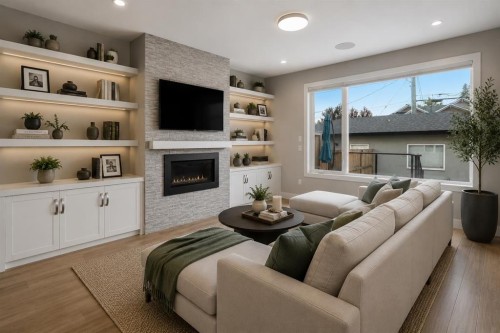 637 14 Avenue Ne, Calgary, AB - Indoor Photo Showing Living Room With Fireplace