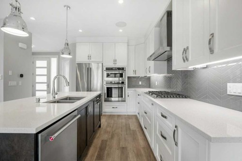 637 14 Avenue Ne, Calgary, AB - Indoor Photo Showing Kitchen With Stainless Steel Kitchen With Double Sink With Upgraded Kitchen