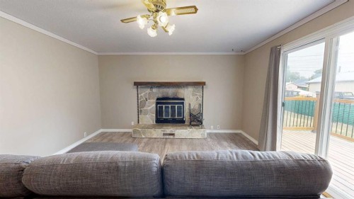 348 47 Avenue West, Claresholm, AB - Indoor With Fireplace