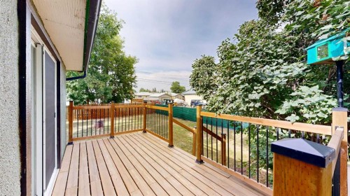 348 47 Avenue West, Claresholm, AB - Outdoor With Deck Patio Veranda With Exterior