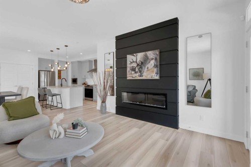 47 Walgrove Park Se, Calgary, AB - Indoor Photo Showing Living Room With Fireplace