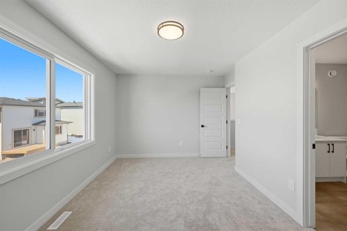 42 Waterford Mews, Chestermere, AB - Indoor Photo Showing Other Room