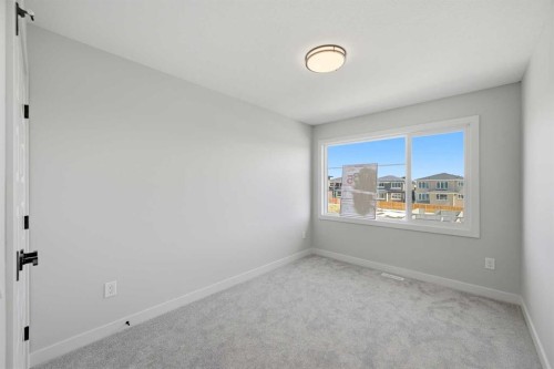 42 Waterford Mews, Chestermere, AB - Indoor Photo Showing Other Room