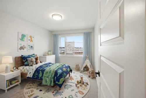 42 Waterford Mews, Chestermere, AB - Indoor Photo Showing Bedroom