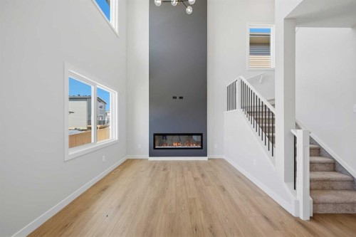 46 Waterford Mews, Chestermere, AB - Indoor With Fireplace