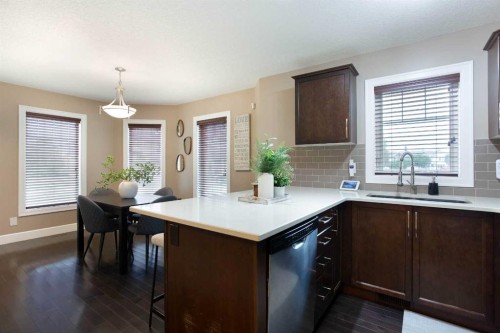 1575 Windstone Road Sw, Airdrie, AB - Indoor Photo Showing Kitchen