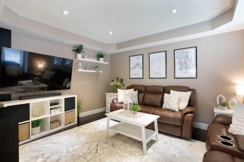 1575 Windstone Road Sw, Airdrie, AB - Indoor Photo Showing Living Room