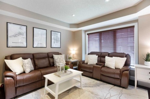 1575 Windstone Road Sw, Airdrie, AB - Indoor Photo Showing Living Room