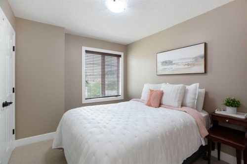 1575 Windstone Road Sw, Airdrie, AB - Indoor Photo Showing Bedroom