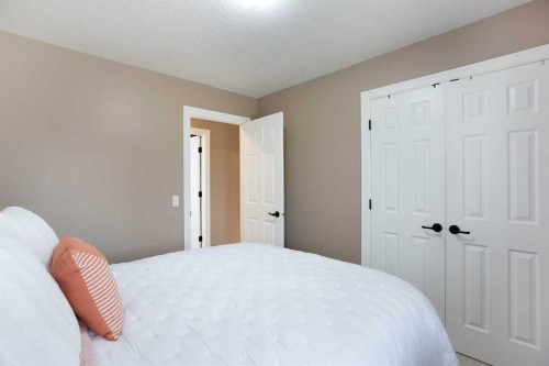 1575 Windstone Road Sw, Airdrie, AB - Indoor Photo Showing Bedroom