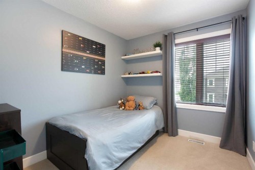 1575 Windstone Road Sw, Airdrie, AB - Indoor Photo Showing Bedroom
