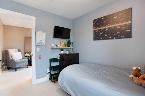 1575 Windstone Road Sw, Airdrie, AB - Indoor Photo Showing Bedroom