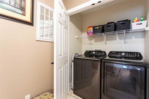 1575 Windstone Road Sw, Airdrie, AB - Indoor Photo Showing Laundry Room