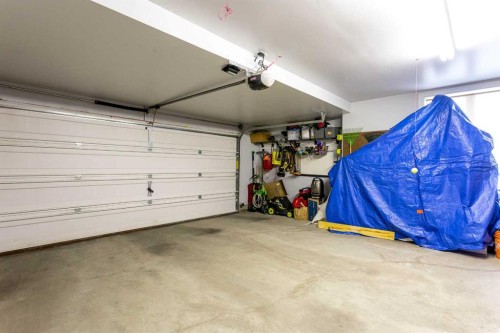 1575 Windstone Road Sw, Airdrie, AB - Indoor Photo Showing Garage