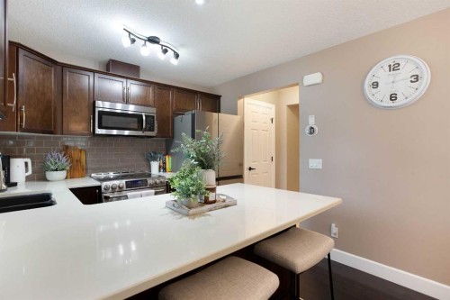 1575 Windstone Road Sw, Airdrie, AB - Indoor Photo Showing Kitchen