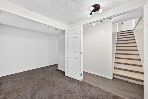 7964 Huntington Road Ne, Calgary, AB - Indoor Photo Showing Other Room