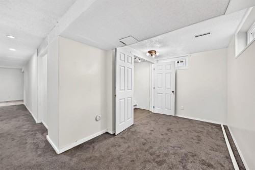 7964 Huntington Road Ne, Calgary, AB - Indoor Photo Showing Other Room