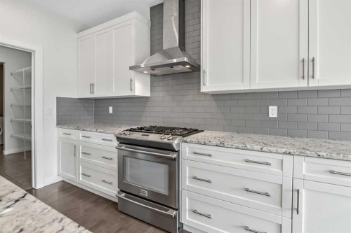 41 Westridge Road, Okotoks, AB - Indoor Photo Showing Kitchen With Upgraded Kitchen