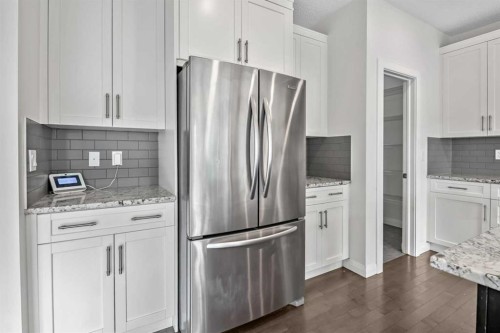 41 Westridge Road, Okotoks, AB - Indoor Photo Showing Kitchen With Upgraded Kitchen