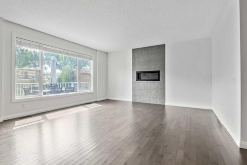 41 Westridge Road, Okotoks, AB - Indoor Photo Showing Living Room With Fireplace