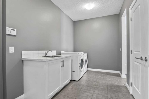 41 Westridge Road, Okotoks, AB - Indoor Photo Showing Laundry Room