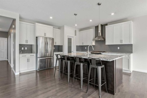 41 Westridge Road, Okotoks, AB - Indoor Photo Showing Kitchen With Upgraded Kitchen