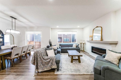 156 Savanna Drive Ne, Calgary, AB - Indoor Photo Showing Living Room With Fireplace