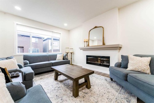 156 Savanna Drive Ne, Calgary, AB - Indoor Photo Showing Living Room With Fireplace