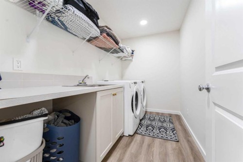156 Savanna Drive Ne, Calgary, AB - Indoor Photo Showing Laundry Room