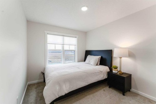 156 Savanna Drive Ne, Calgary, AB - Indoor Photo Showing Bedroom