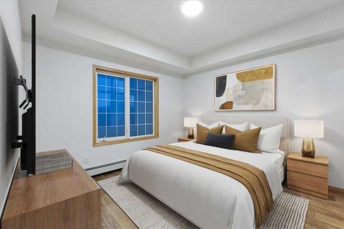 202-4512 52 Avenue, Red Deer, AB - Indoor Photo Showing Bedroom