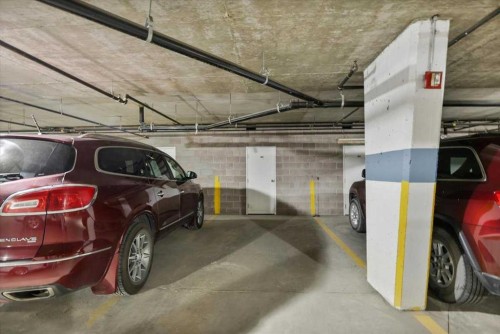 202-4512 52 Avenue, Red Deer, AB - Indoor Photo Showing Garage