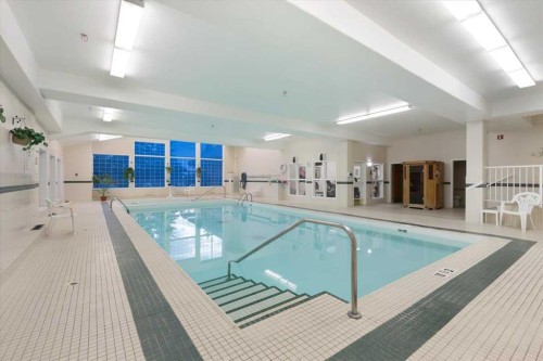 202-4512 52 Avenue, Red Deer, AB - Indoor Photo Showing Other Room With In Ground Pool