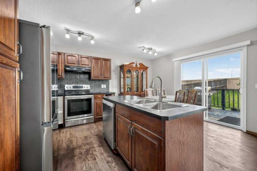88 Everglen Rise Sw, Calgary, AB - Indoor Photo Showing Kitchen With Double Sink