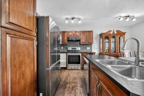 88 Everglen Rise Sw, Calgary, AB - Indoor Photo Showing Kitchen With Double Sink