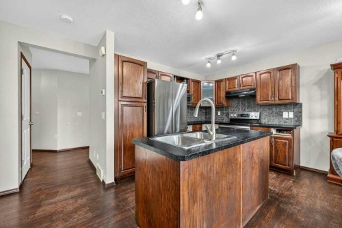 88 Everglen Rise Sw, Calgary, AB - Indoor Photo Showing Kitchen With Double Sink