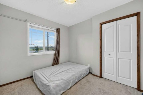88 Everglen Rise Sw, Calgary, AB - Indoor Photo Showing Bedroom