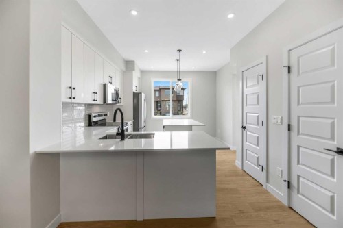 17 Savanna Place Ne, Calgary, AB - Indoor Photo Showing Kitchen With Upgraded Kitchen
