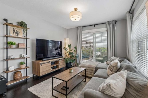 3317-11 Mahogany Row Se, Calgary, AB - Indoor Photo Showing Living Room