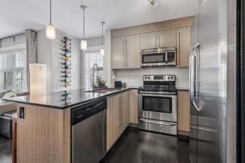 3317-11 Mahogany Row Se, Calgary, AB - Indoor Photo Showing Kitchen With Stainless Steel Kitchen With Upgraded Kitchen
