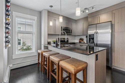 3317-11 Mahogany Row Se, Calgary, AB - Indoor Photo Showing Kitchen With Stainless Steel Kitchen With Double Sink With Upgraded Kitchen