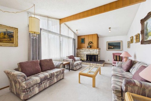 2012 Urbana Road Nw, Calgary, AB - Indoor Photo Showing Living Room With Fireplace