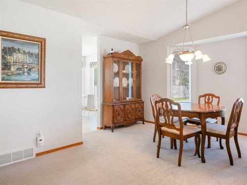 277 Arbour Cliff Close Nw, Calgary, AB - Indoor Photo Showing Dining Room