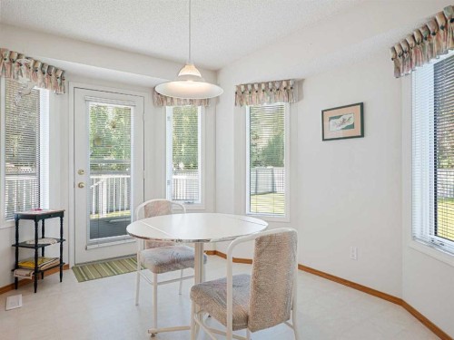 277 Arbour Cliff Close Nw, Calgary, AB - Indoor Photo Showing Dining Room