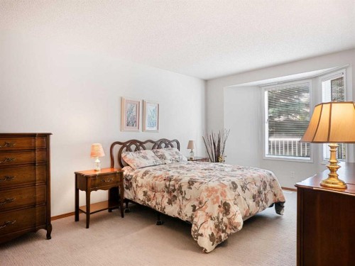 277 Arbour Cliff Close Nw, Calgary, AB - Indoor Photo Showing Bedroom