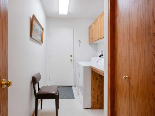 277 Arbour Cliff Close Nw, Calgary, AB - Indoor Photo Showing Laundry Room